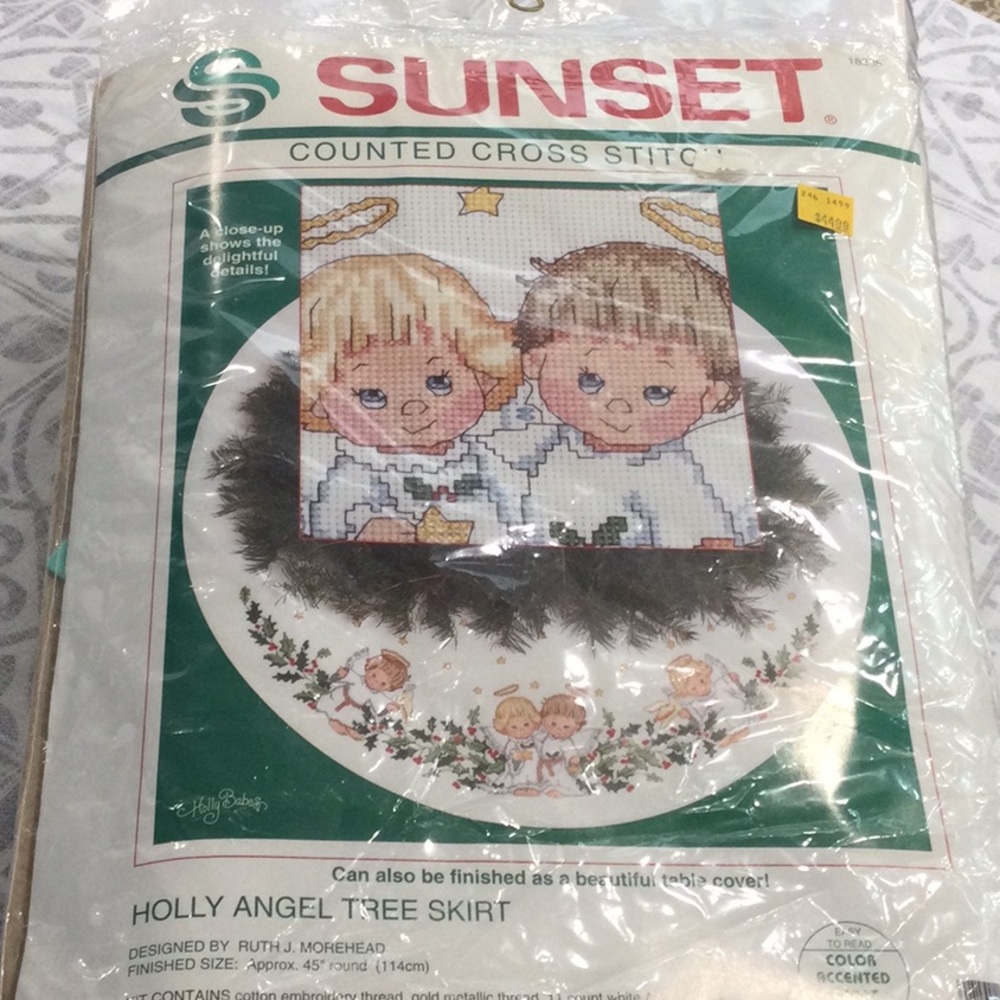 Sunset counted cross stitch Christmas tree skirt. Holly Angel vintage 1992